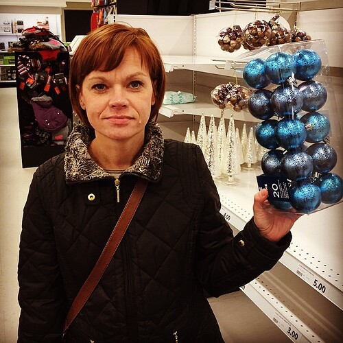 Pam has red hair and blue balls.