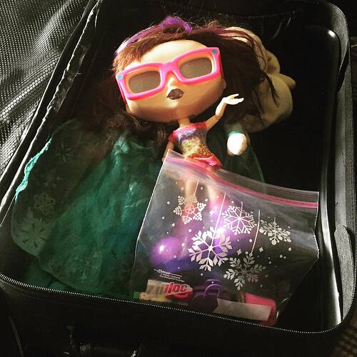 Carmen, packing the important stuff for her trip.