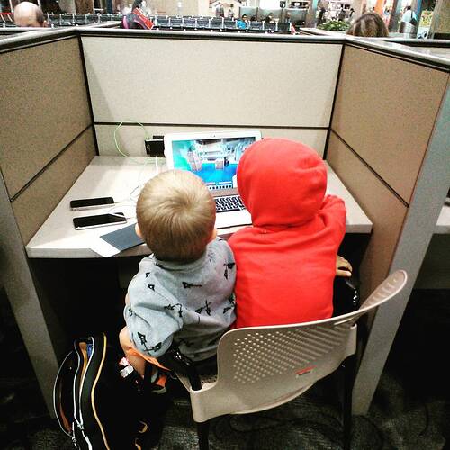 "Business Travellers" at the airport workstation.