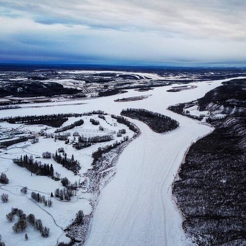 In between the snow and rain today, I managed to snap this drone photo from Snye Point, looking North towards the Athabaskan River.  #ymm #mavic