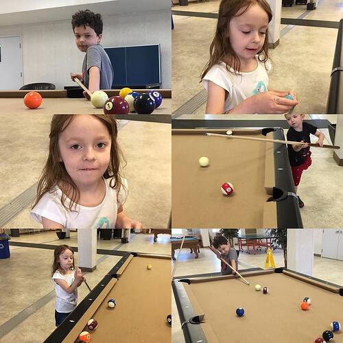 My kids learning how to play pool at Wandering River :-)