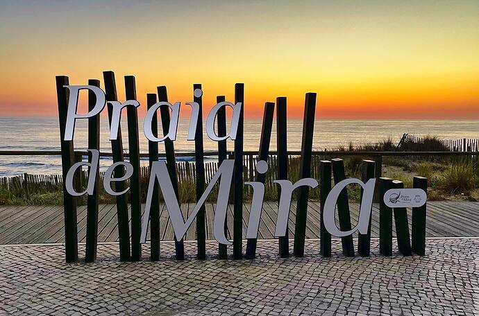 Praia de Mira sign at sunset.