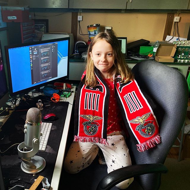 Carmen wearing her Benfica scarf for her online class today.